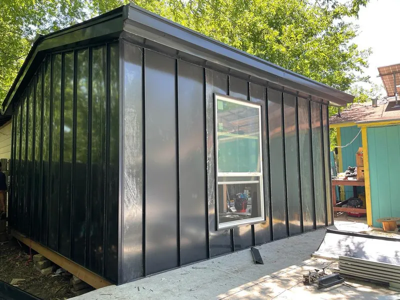 Black standing seam metal wall panels for Roof Inspection in Dunkirk