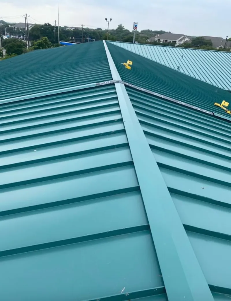 Green commercial metal roof ridge and valley for Metal Roof Repair in Dunkirk